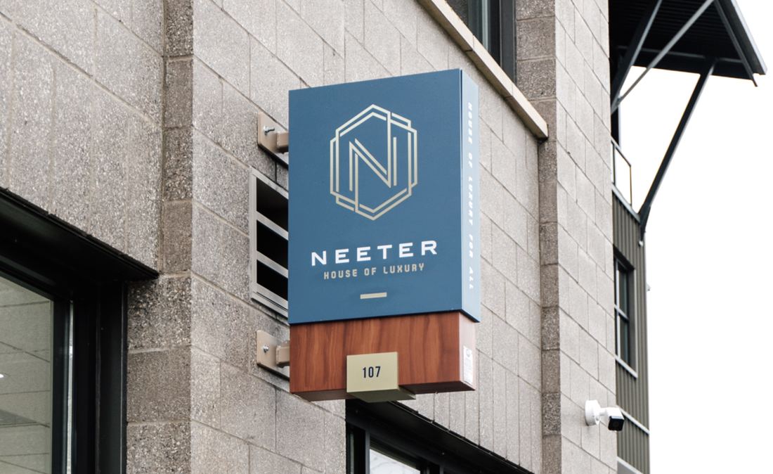 Neeter House of Luxury exterior signage